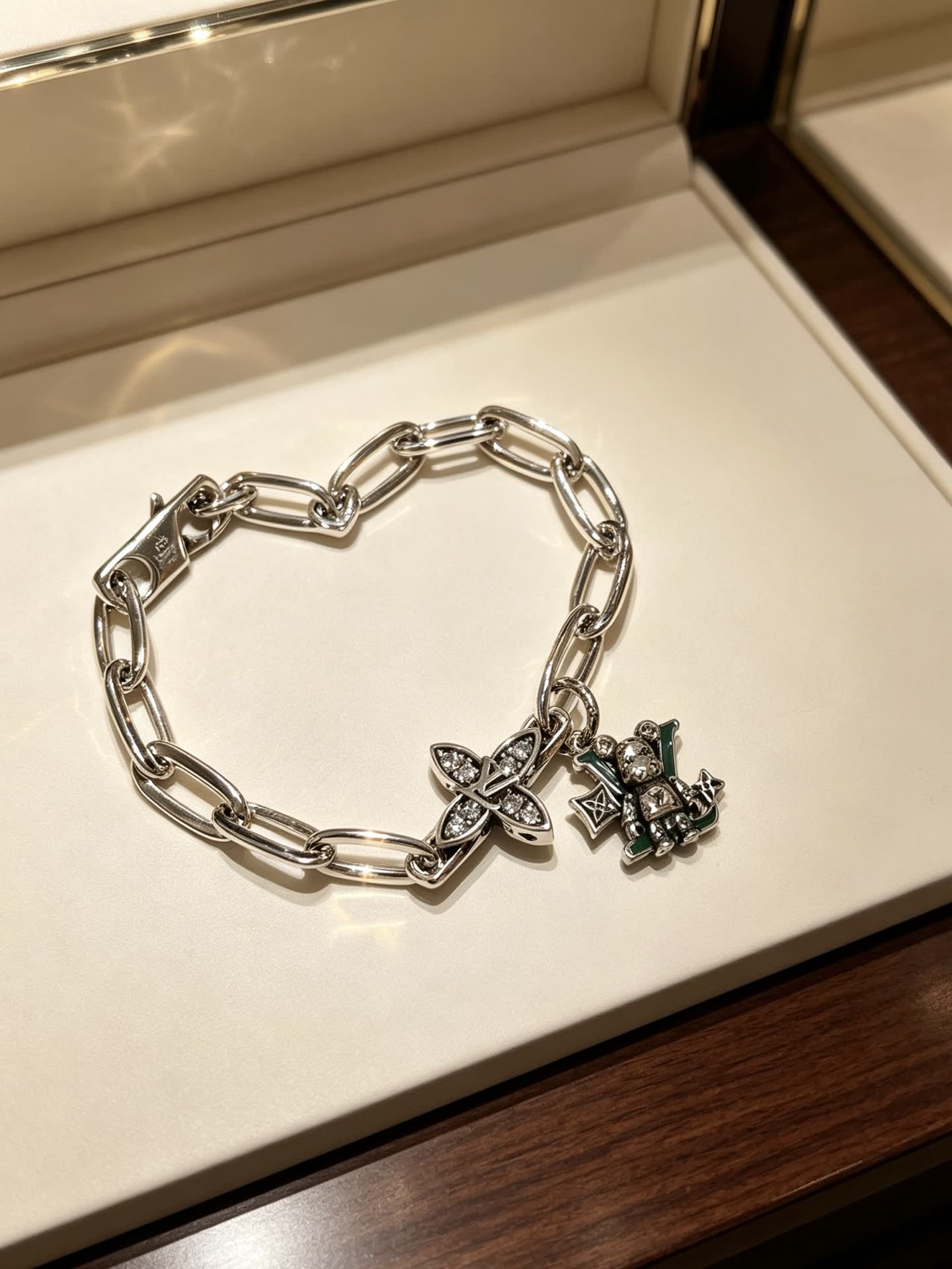 Louis Vuitton Silver Charm Bracelet with Butterfly and Heart Charms